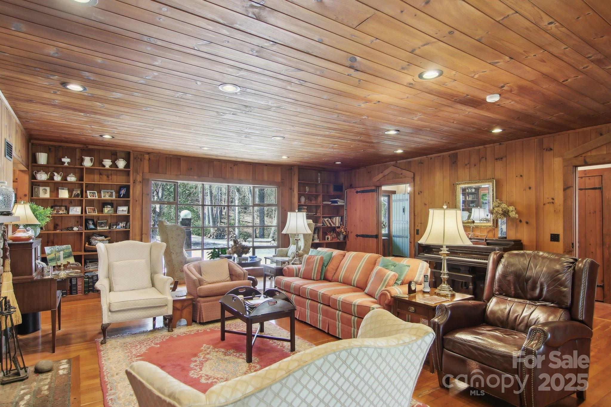 798 Evans Road Hendersonville, NC 28739 - Photo 4 of 45 a living room with furniture and a large window