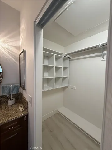a view of an empty walk in closet