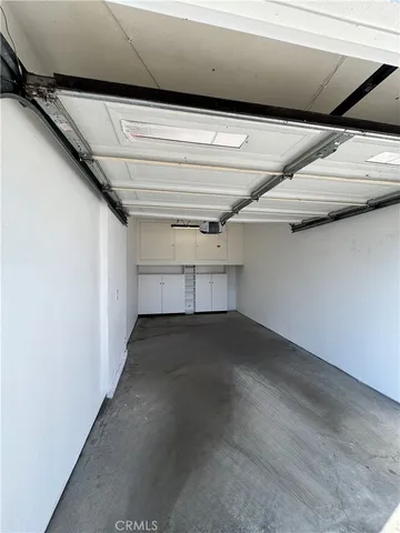 a view of house with outdoor space and swimming pool