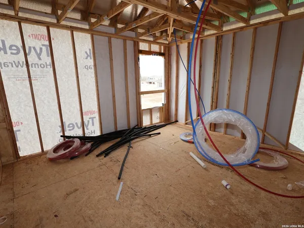 a room with furniture and a window