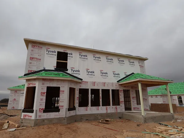 front view of a building with a street