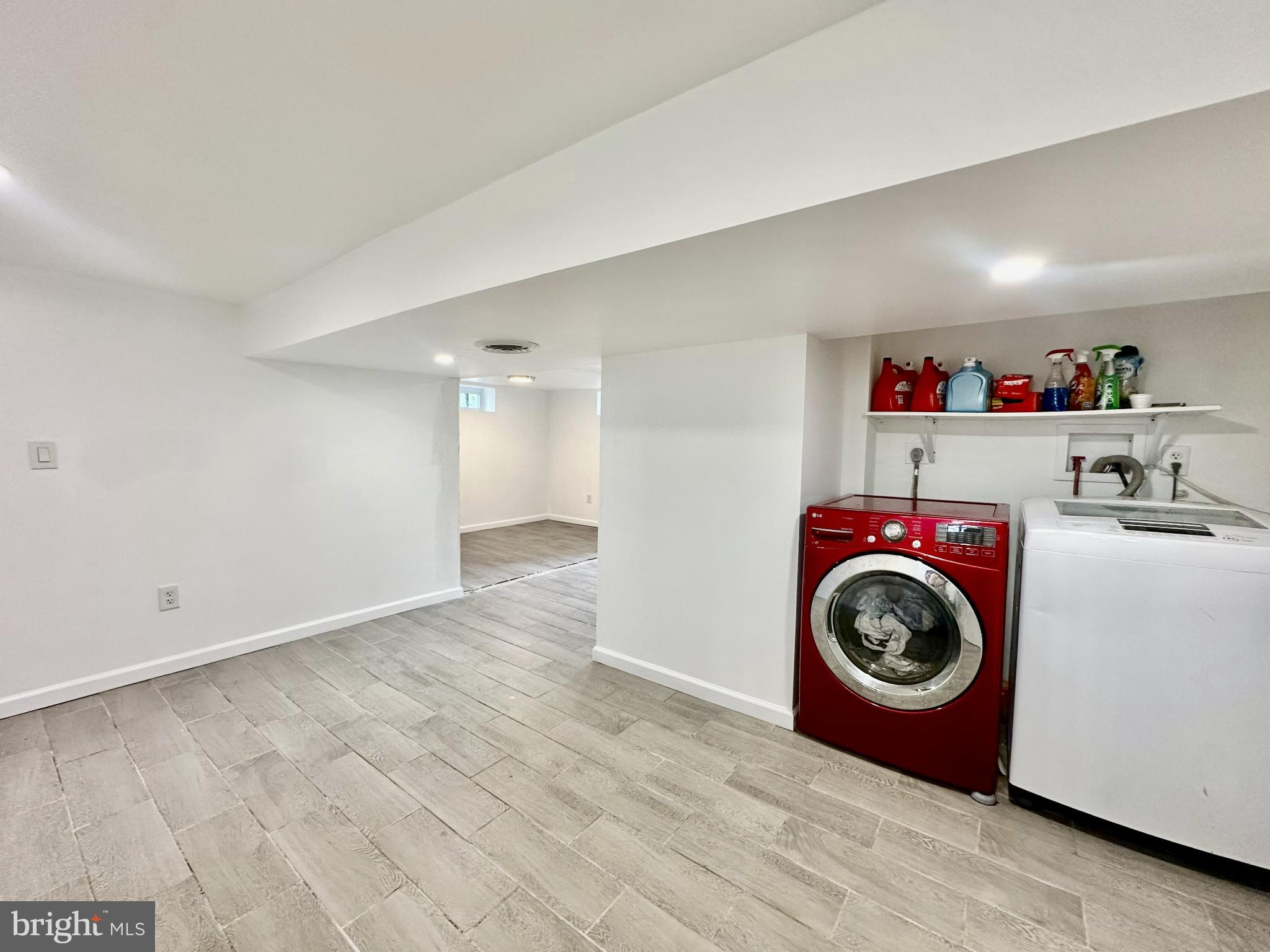 632 Durham Road Newtown, PA 18940 - Photo 27 of 36 a view of a storage & utility room with washer and dryer
