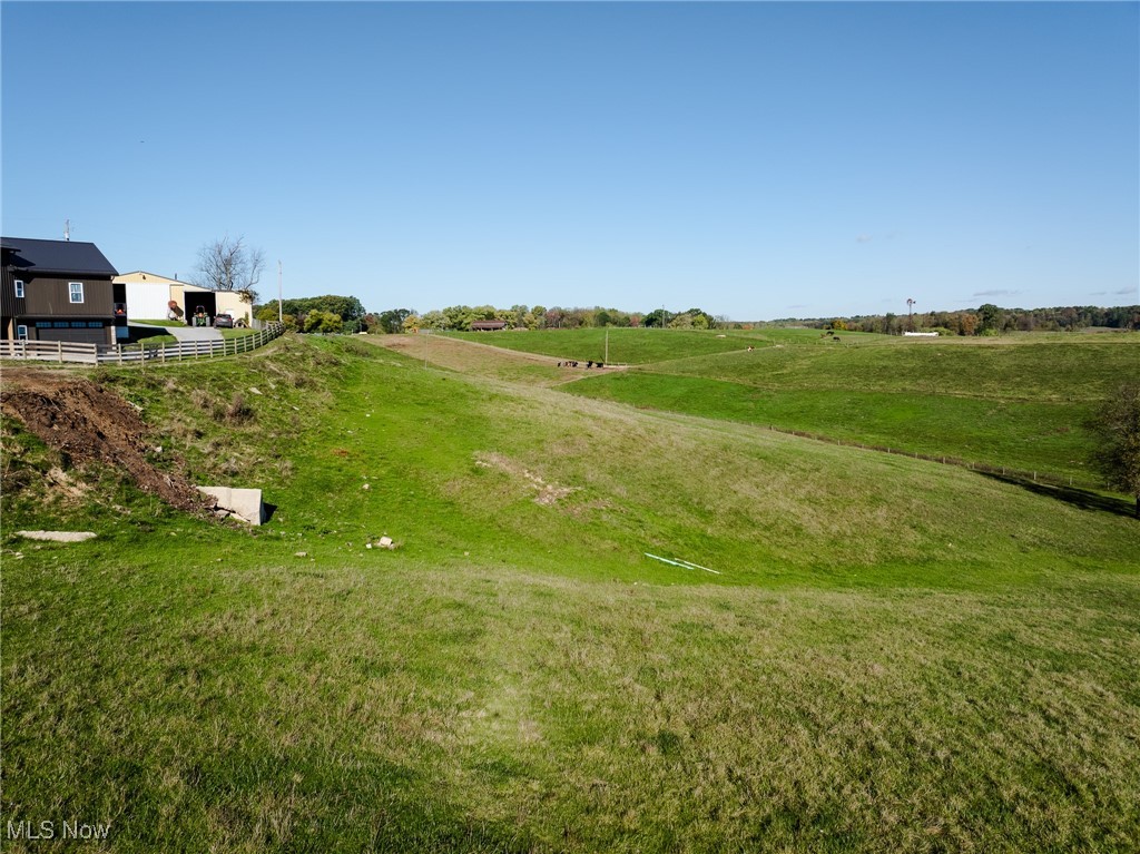 Golf Course Road Northwest Sugarcreek, OH 44681 - Photo 14 of 21 View of home's community featuring a rural view and a yard