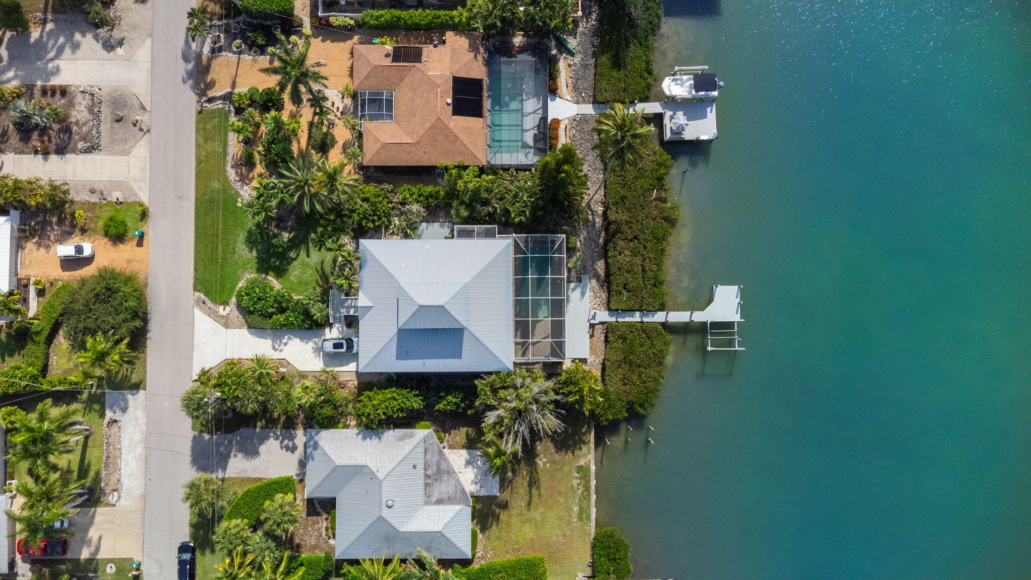 418 Panay Avenue Naples, FL 34113 - Photo 21 of 53 an aerial view of a house with a garden