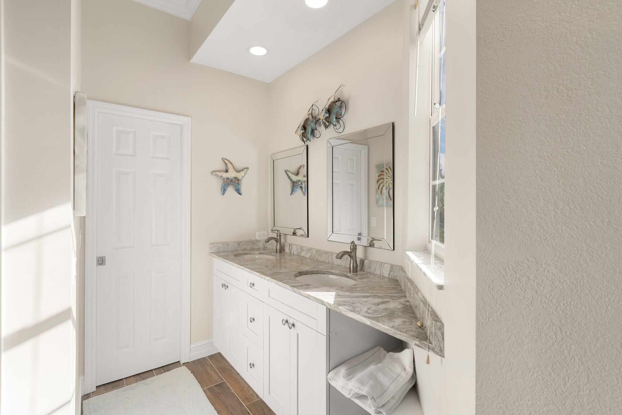 418 Panay Avenue Naples, FL 34113 - Photo 34 of 53 a bathroom with a granite countertop sink and a mirror
