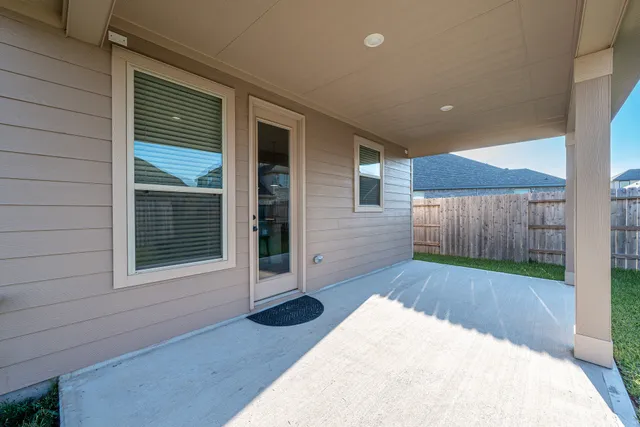 a view of a backyard of a house