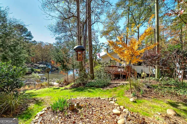 a view of a yard with an trees