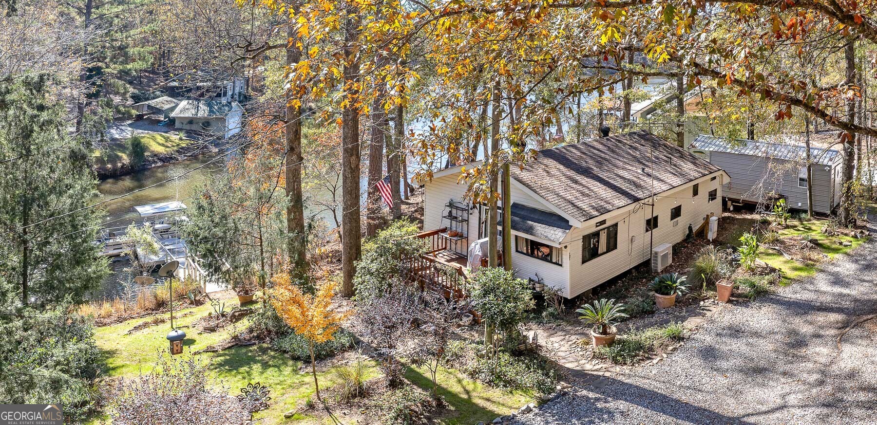 121 Cedar Drive Jackson, GA 30233 - Photo 17 of 50 a view of a house with a yard and large trees