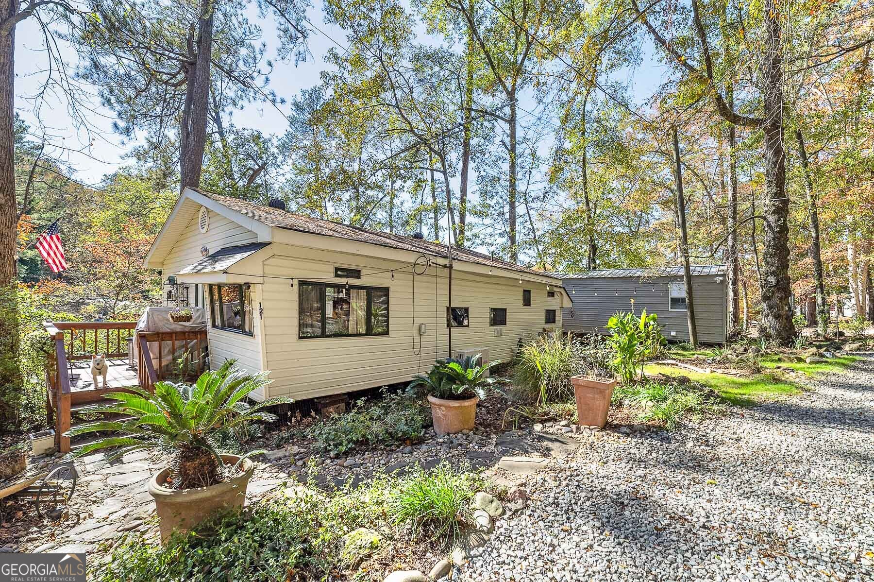 121 Cedar Drive Jackson, GA 30233 - Photo 18 of 50 a front view of a house with garden