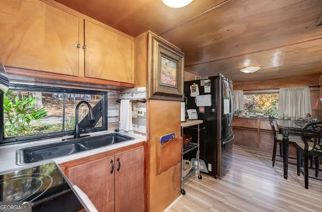 a room with furniture and flat screen tv