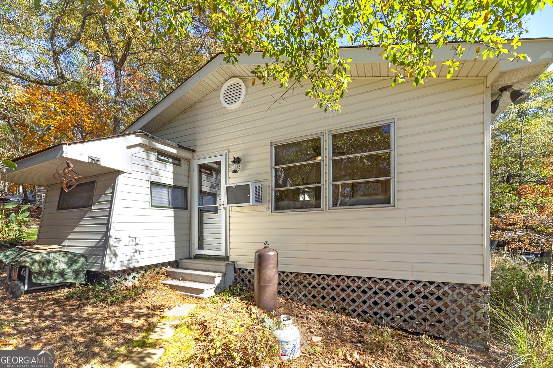 121 Cedar Drive Jackson, GA 30233 - Photo 37 of 50 a front view of a house with a yard