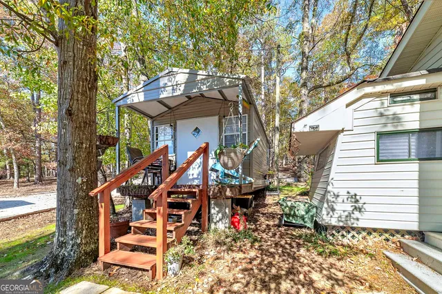 a view of a yard with trees