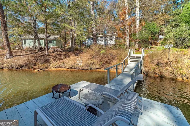 a view of an ocean with trees