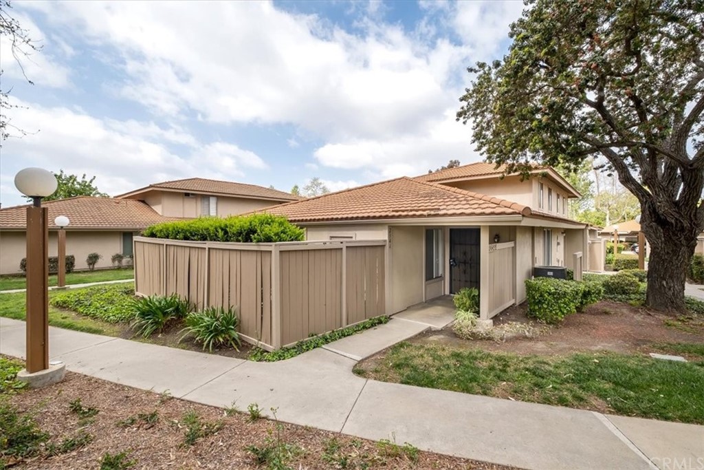 2344 Medlar Road Tustin, CA 92780 - Photo 1 of 1 a front view of a house with garden