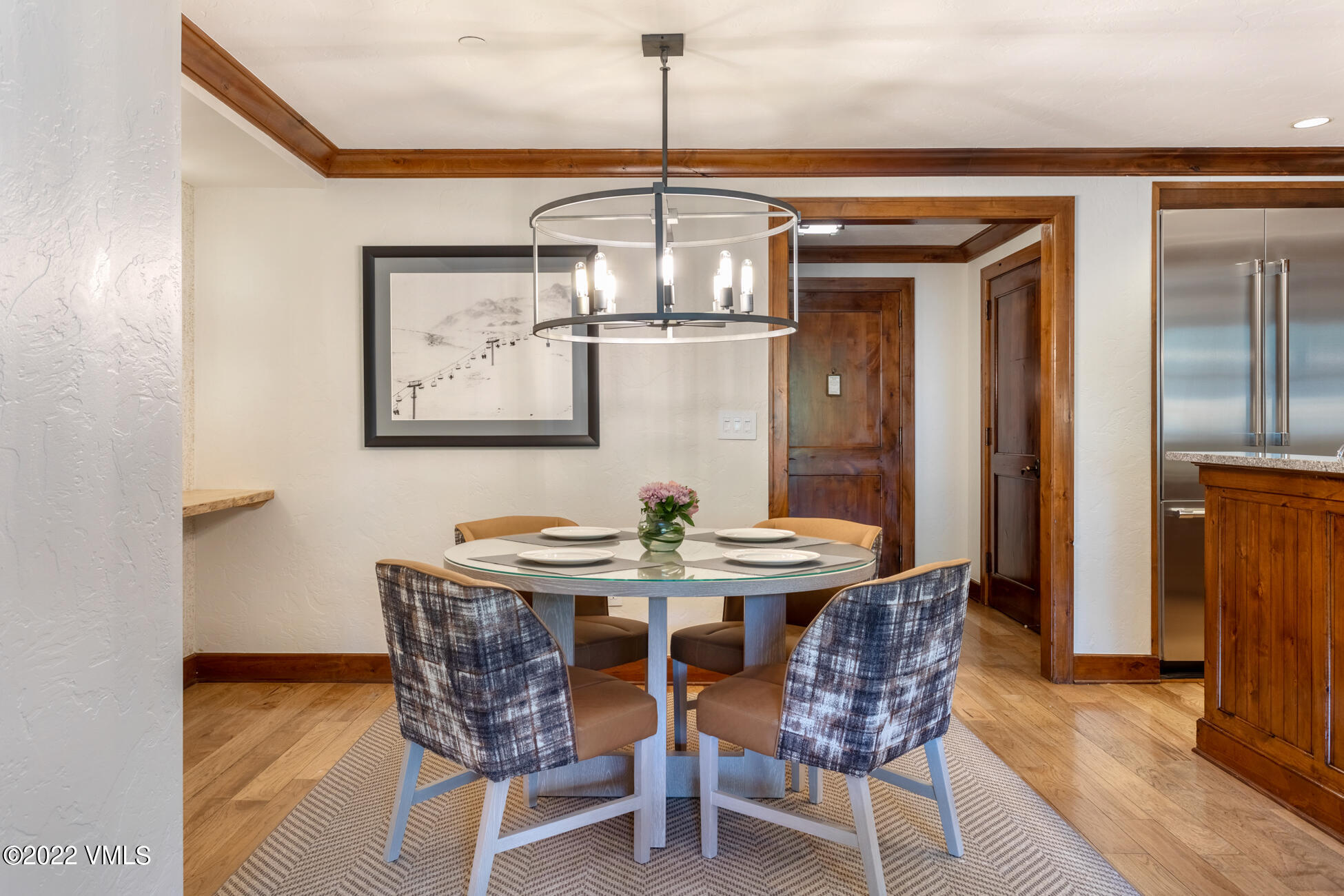 100 Bachelor Ridge Road, Unit 3410 Avon, CO 81620 - Photo 7 of 47 a view of a dining room with furniture window and wooden floor