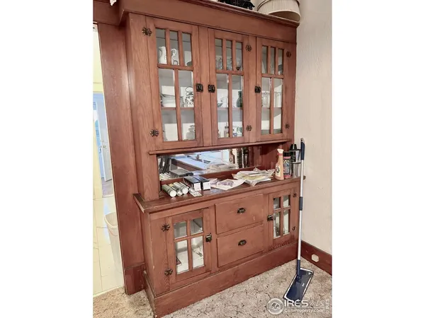 a kitchen with a stove and a microwave