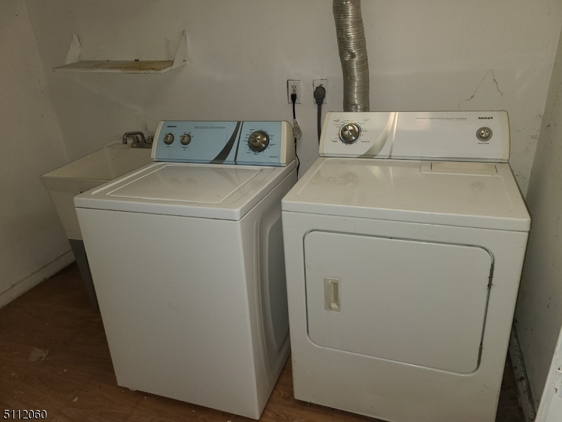 157 Valley Road Montclair, NJ 07042 - Photo 14 of 14 a utility room with dryer and washer