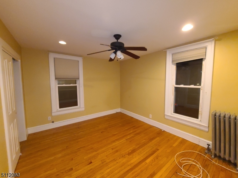 157 Valley Road Montclair, NJ 07042 - Photo 9 of 14 a view of empty room with a ceiling fan