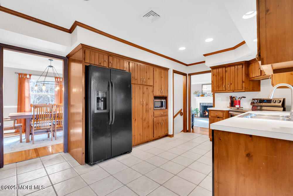 1798 Todd Road Toms River, NJ 08755 - Photo 14 of 61 a kitchen with stainless steel appliances granite countertop a refrigerator and a sink