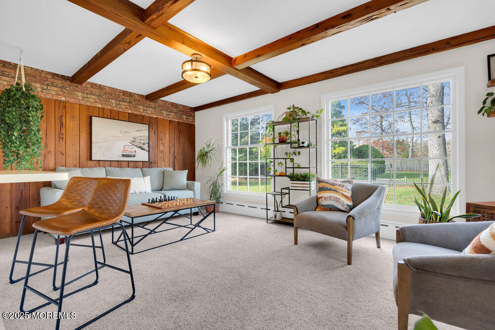 1798 Todd Road Toms River, NJ 08755 - Photo 15 of 61 a living room with furniture and a floor to ceiling windows