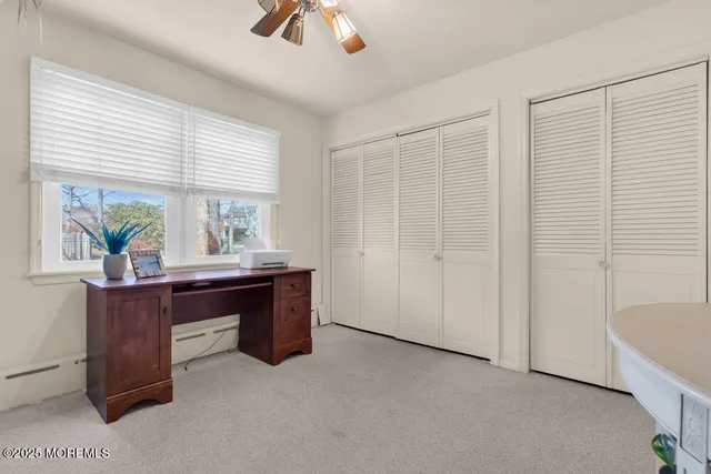a bathroom with a shower and a bath tub