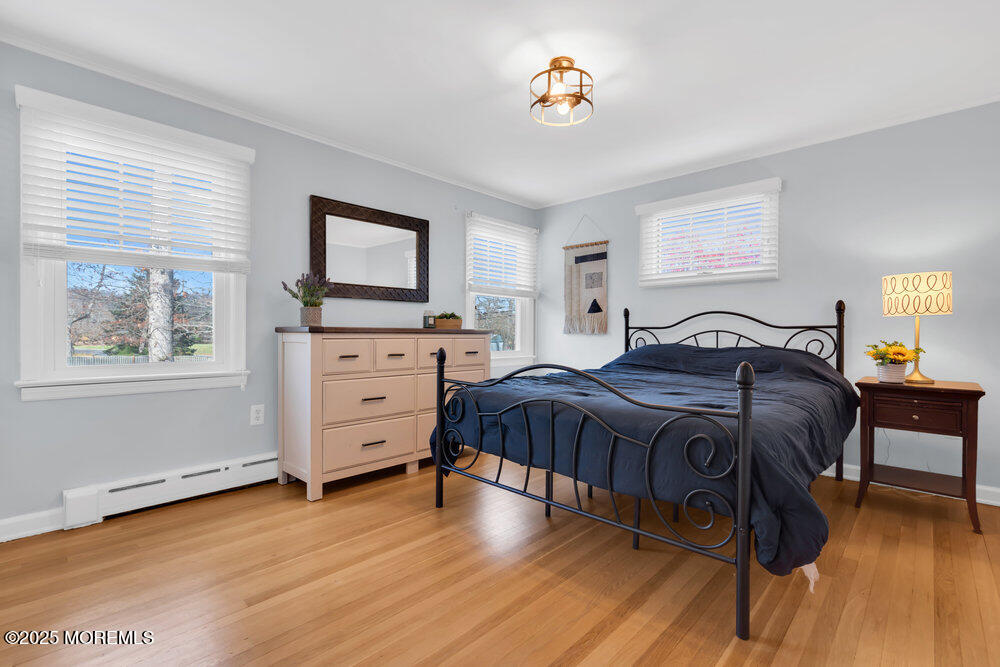 1798 Todd Road Toms River, NJ 08755 - Photo 24 of 61 a spacious bedroom with a bed and a table in it