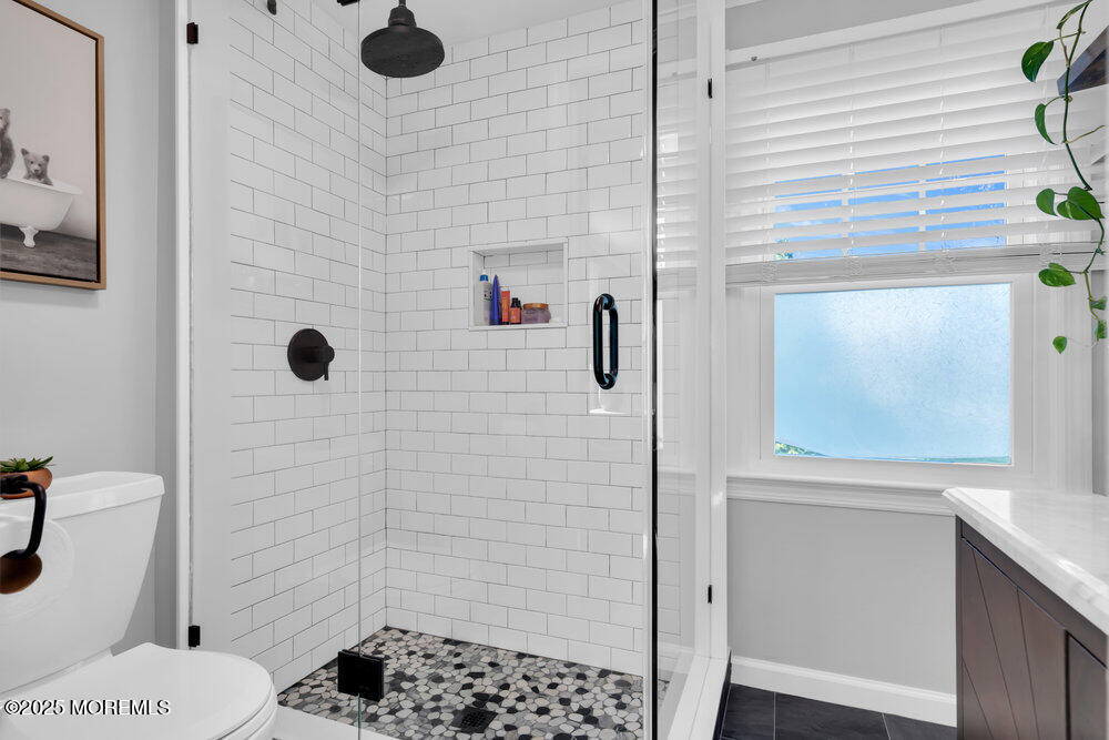 1798 Todd Road Toms River, NJ 08755 - Photo 31 of 61 a bathroom with a toilet and shower