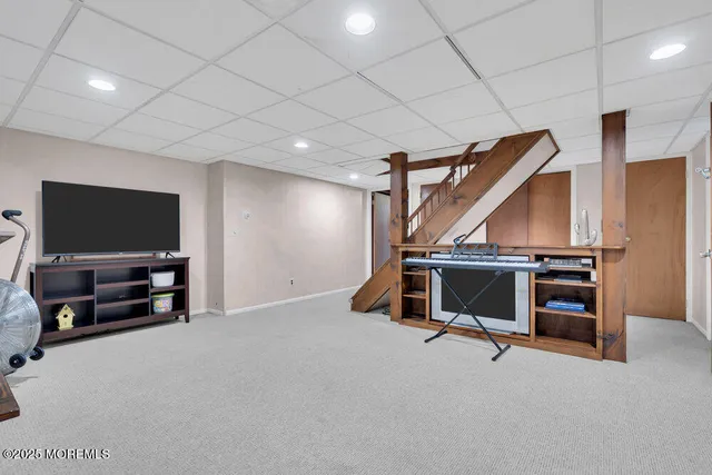 a kitchen with stainless steel appliances granite countertop a stove and a microwave
