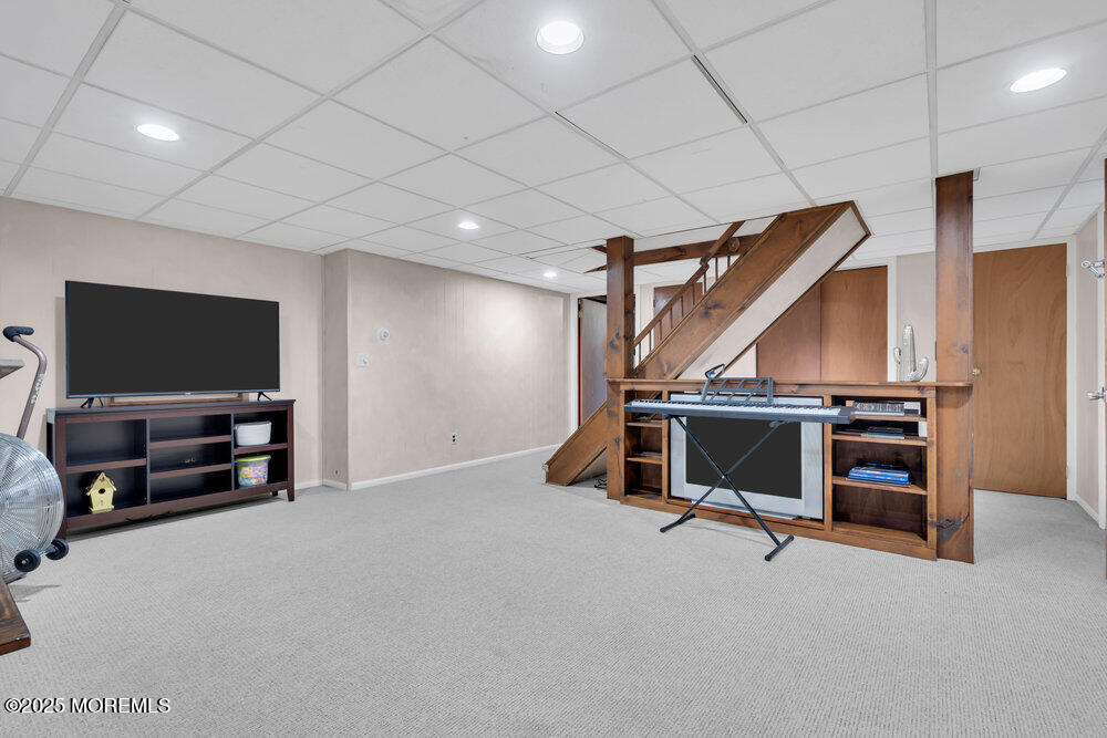 1798 Todd Road Toms River, NJ 08755 - Photo 35 of 61 a view of a livingroom with furniture and a flat screen tv