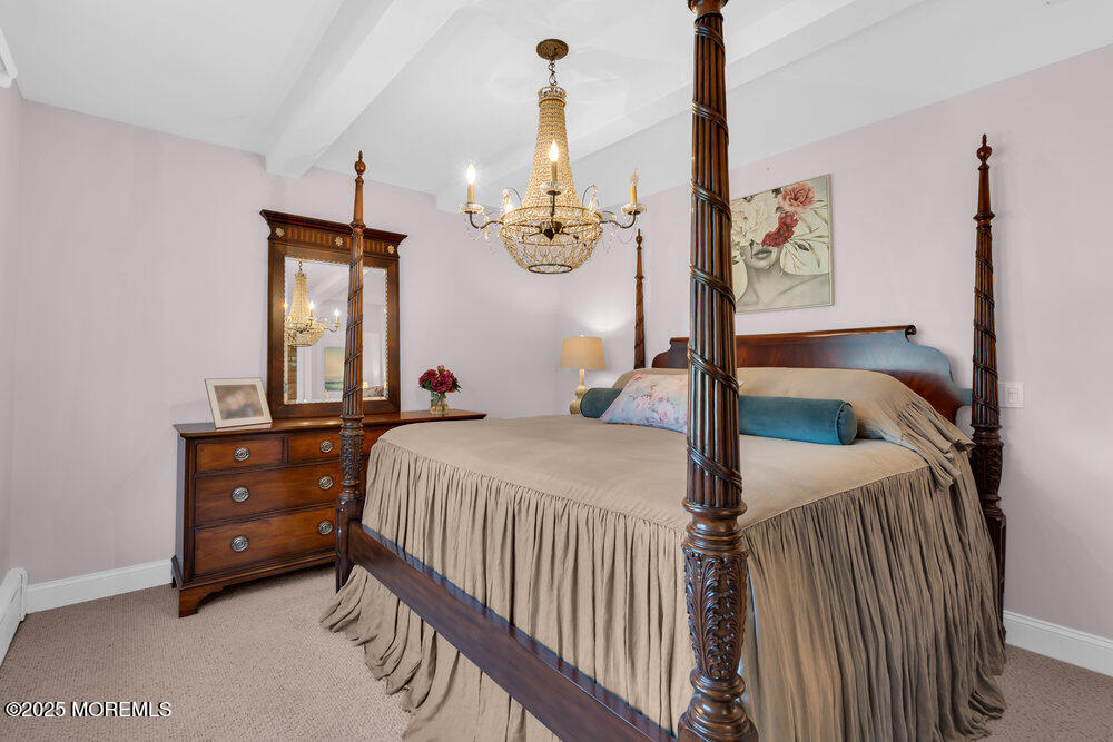 1798 Todd Road Toms River, NJ 08755 - Photo 46 of 61 a bedroom with a bed and a mirror