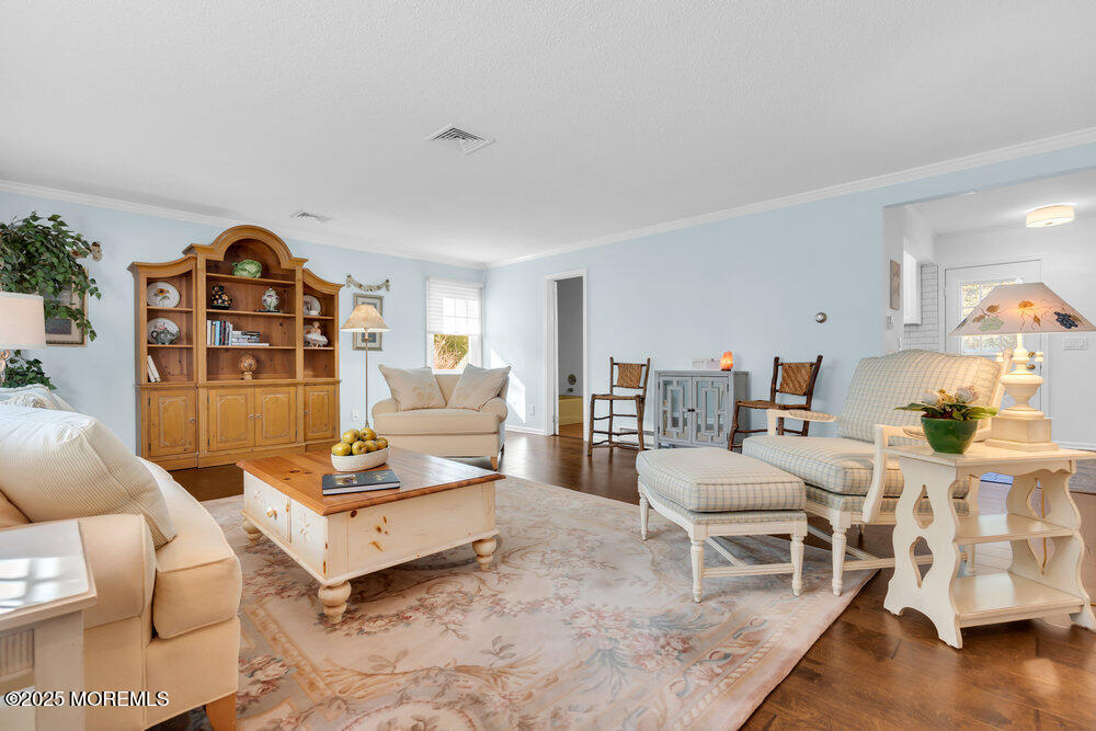 1798 Todd Road Toms River, NJ 08755 - Photo 50 of 61 a living room with furniture a rug and a large window