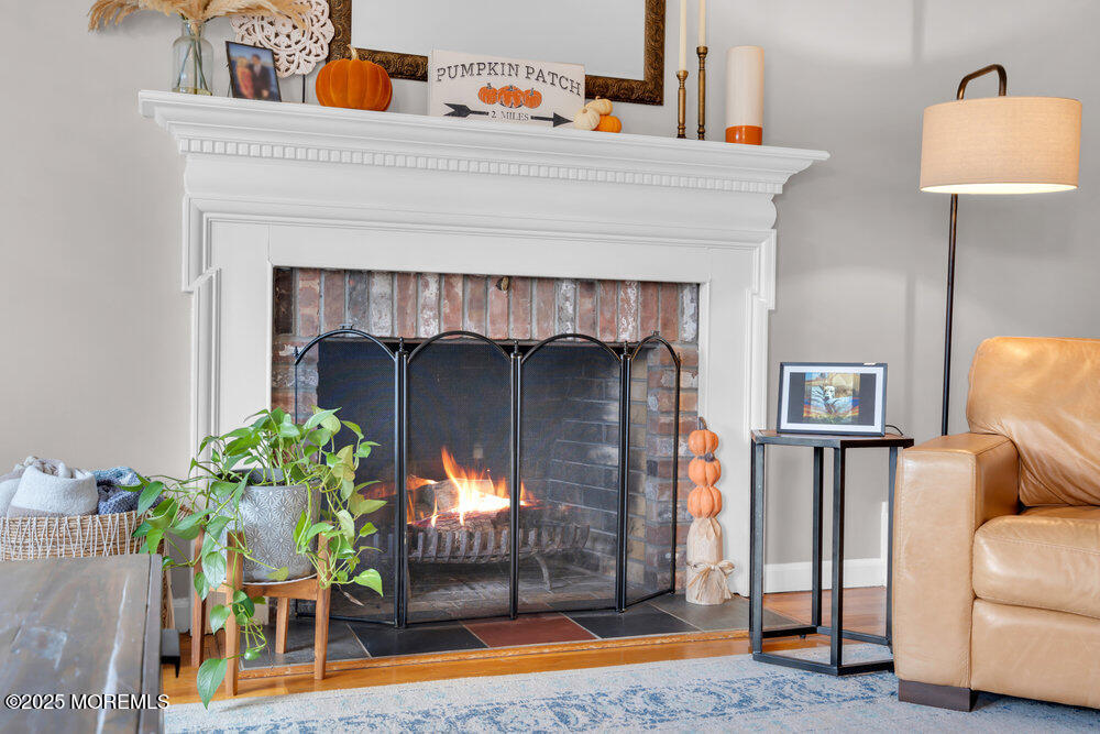 1798 Todd Road Toms River, NJ 08755 - Photo 10 of 61 a living room with furniture and a fireplace