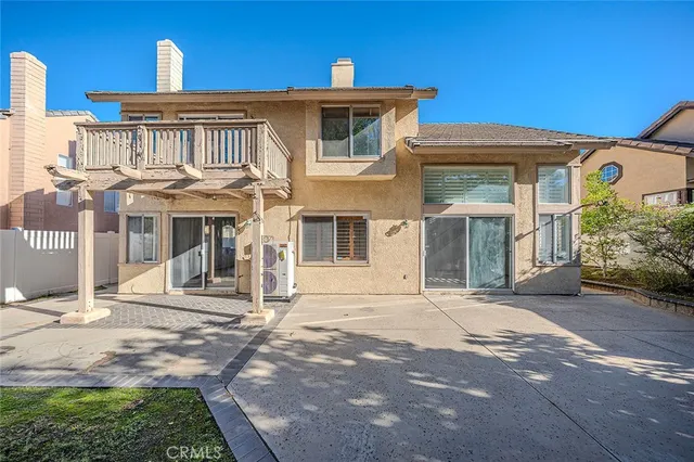 a house view with a outdoor space