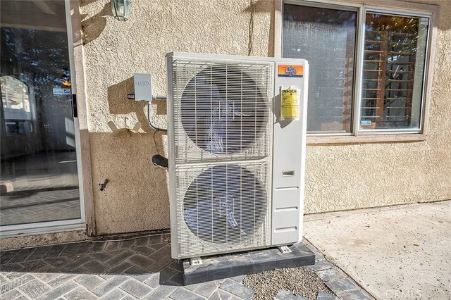 a view of swimming pool with seating area