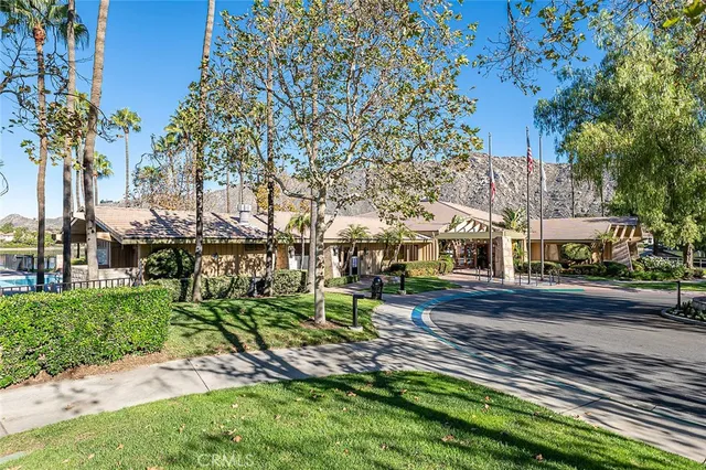 an aerial view of a house with a lake view