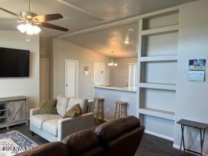 61 North 8620th Show Low, AZ 85901 - Photo 5 of 18 a living room with furniture and a flat screen tv