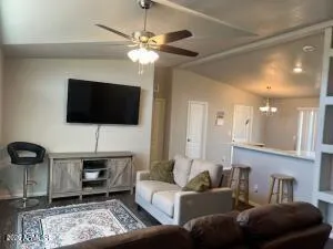 a living room with furniture and a window