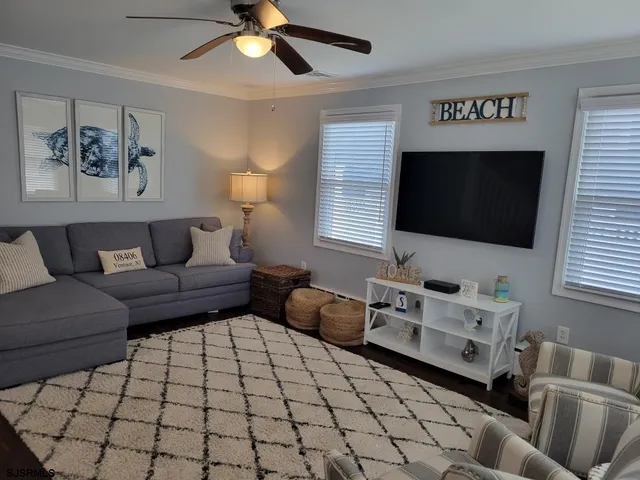 a kitchen with a stove a sink and a refrigerator