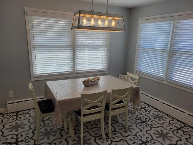 a room with a door and a rug