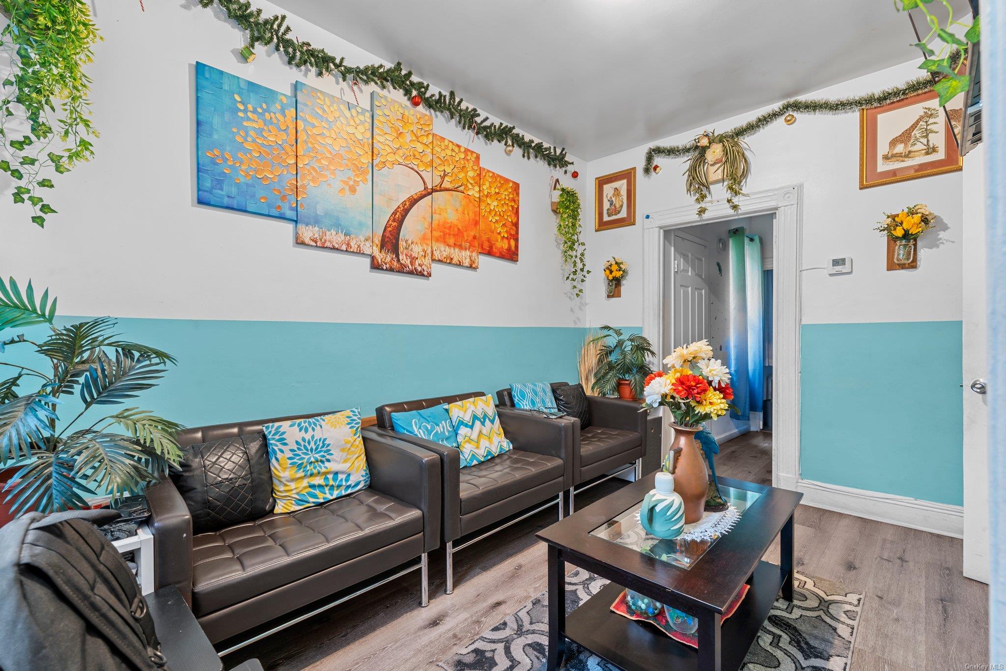 35-18 108th Street Queens, NY 11368 - Photo 13 of 20 Living room featuring hardwood / wood-style flooring