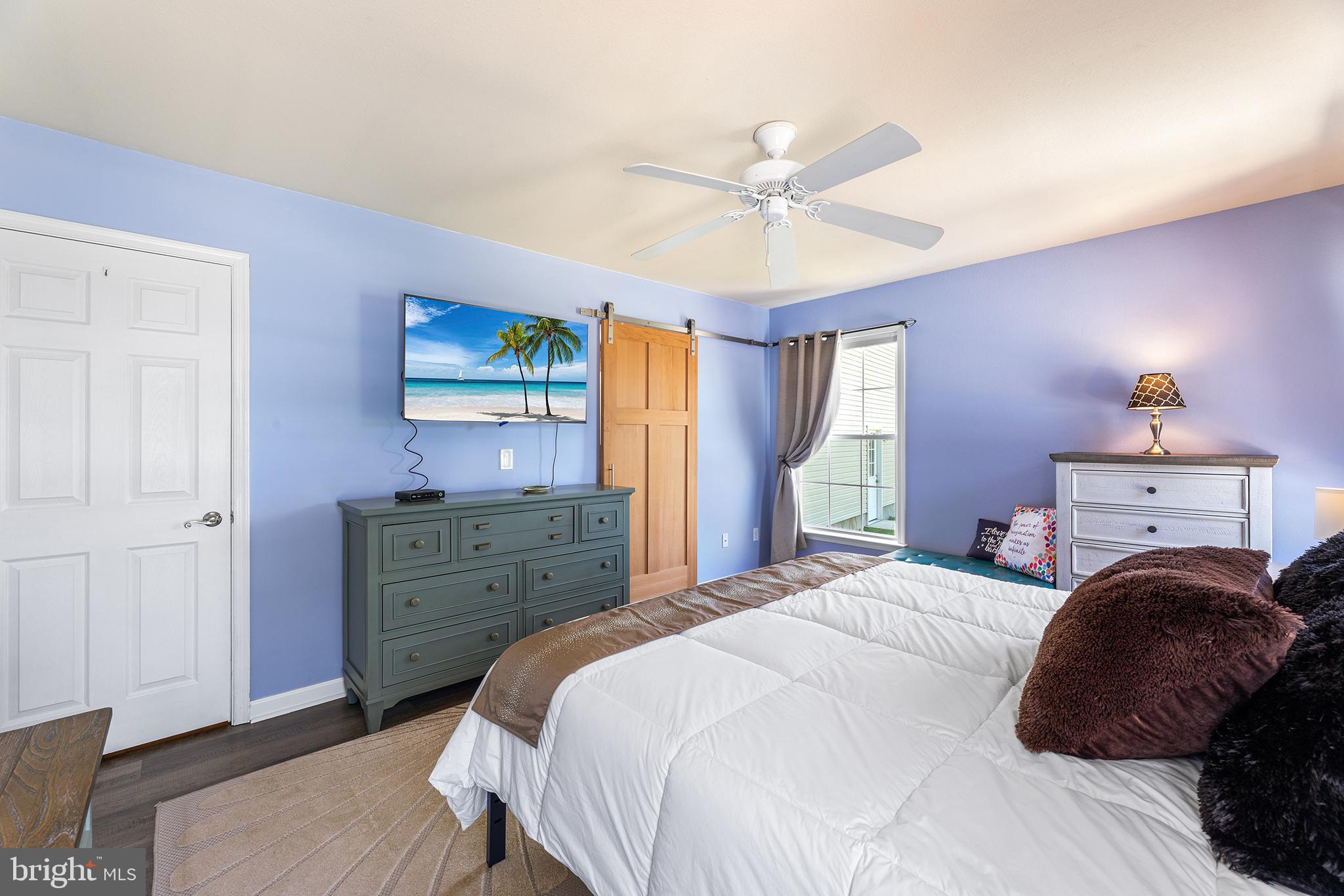 30249 Armory Road Dagsboro, DE 19939 - Photo 23 of 41 a bedroom with a bed and a window