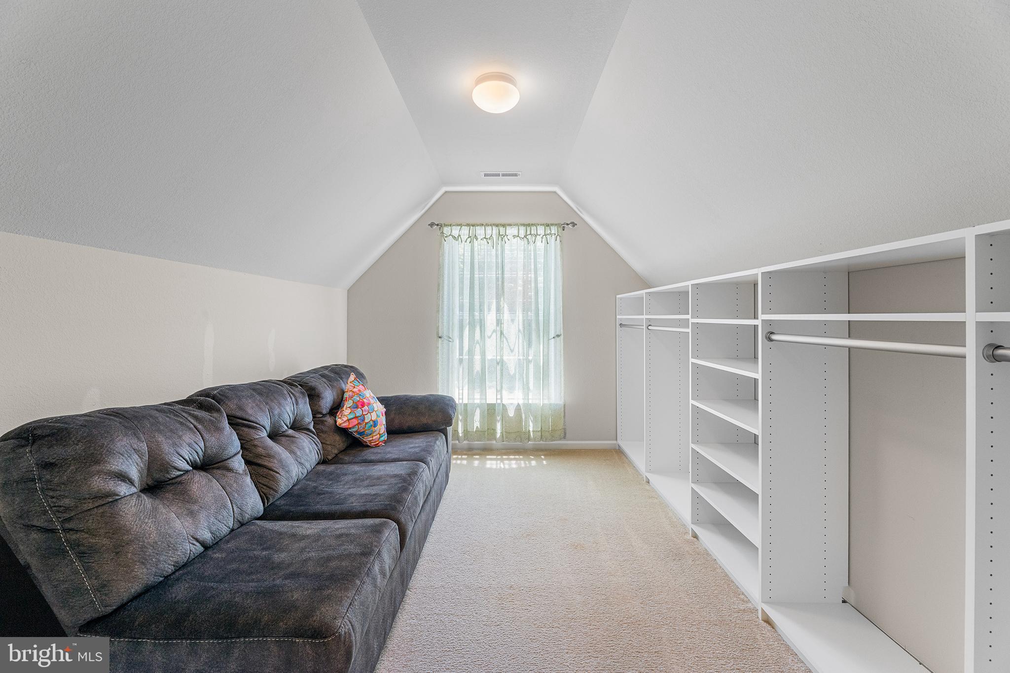 30249 Armory Road Dagsboro, DE 19939 - Photo 32 of 41 a living room with furniture and a window