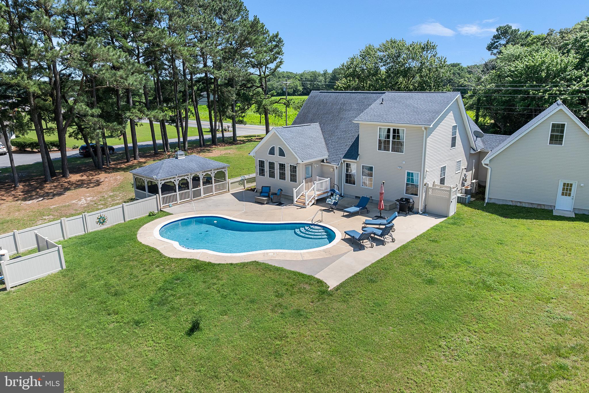 30249 Armory Road Dagsboro, DE 19939 - Photo 36 of 41 a view of a house with backyard porch and sitting area