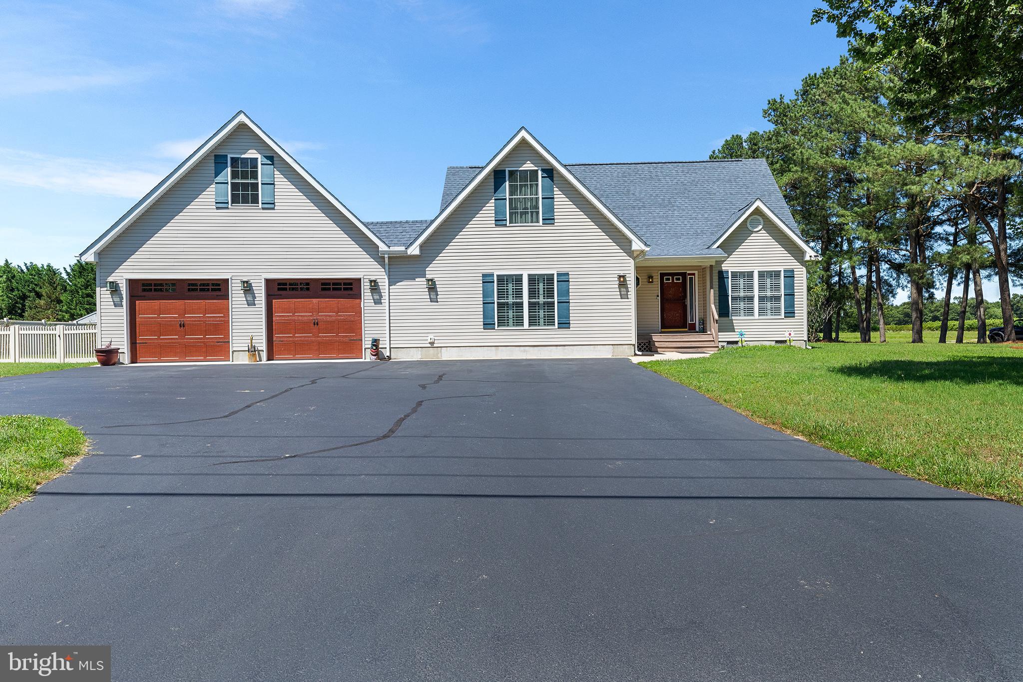 30249 Armory Road Dagsboro, DE 19939 - Photo 4 of 41 a front view of house with yard and green space