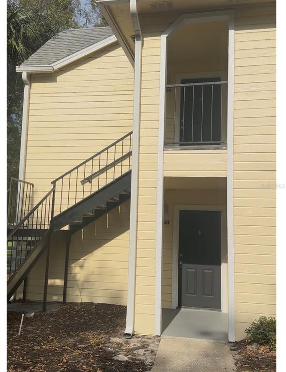 1017 South Hiawassee Road, Unit 3712 Orlando, FL 32835 - Photo 13 of 18 a view of a balcony with a door