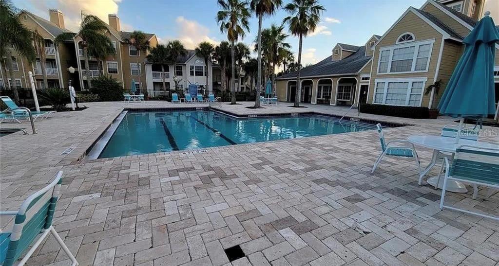1017 South Hiawassee Road, Unit 3712 Orlando, FL 32835 - Photo 16 of 18 a view of a house with swimming pool