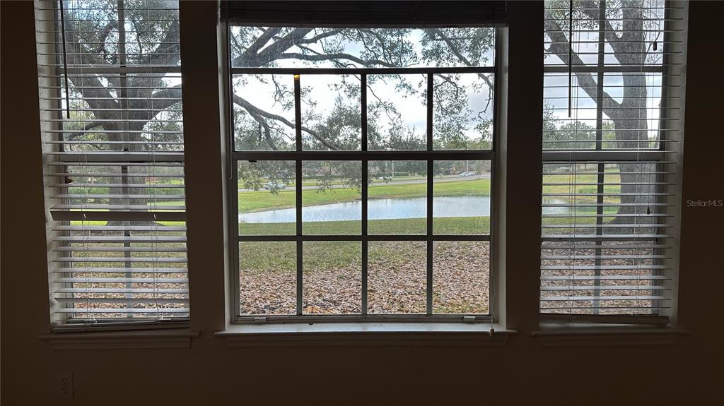 1017 South Hiawassee Road, Unit 3712 Orlando, FL 32835 - Photo 3 of 18 a view of a large window with an outdoor space