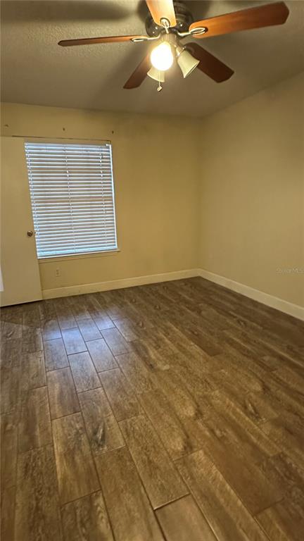 1017 South Hiawassee Road, Unit 3712 Orlando, FL 32835 - Photo 5 of 18 a view of an empty room with a window