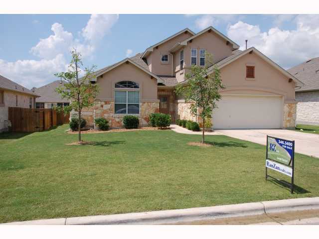 200 Kiras Court Austin, TX 78737 - Photo 1 of 1 a front view of a house with garden
