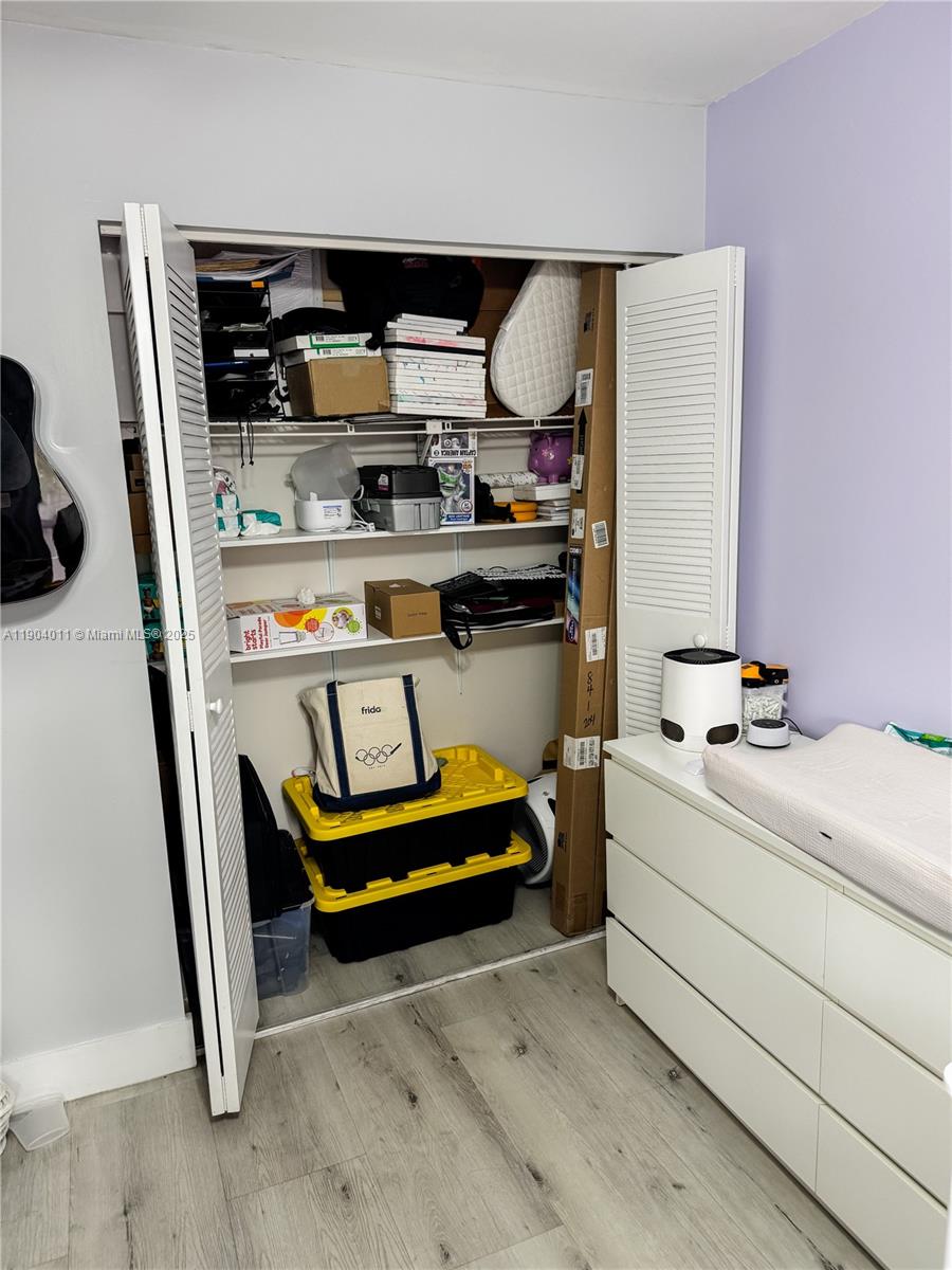 841 Northeast 207th Lane, Unit 3204 Miami, FL 33179 - Photo 11 of 37 a room with storage and utility